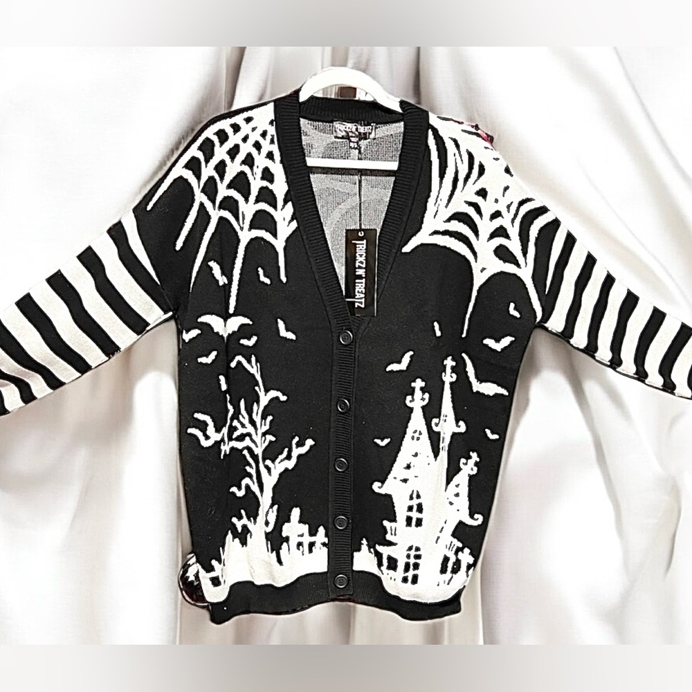 Size M/L……..Black & White Cardigan Halloween themed Sweater. New…Trickz N Treatz